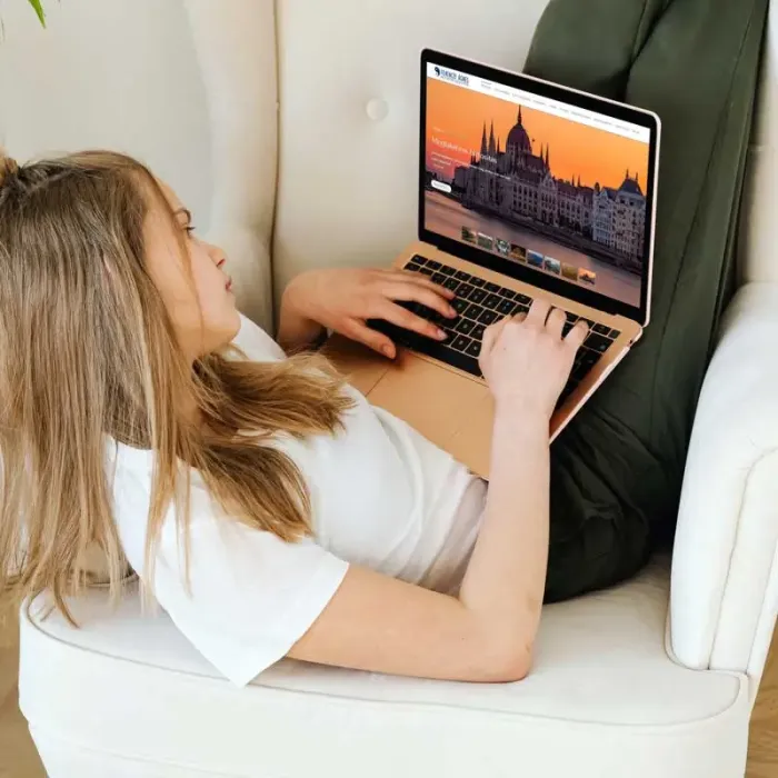 girl reclining in a chair looking at affordable wordpress website maintenance services in the uk